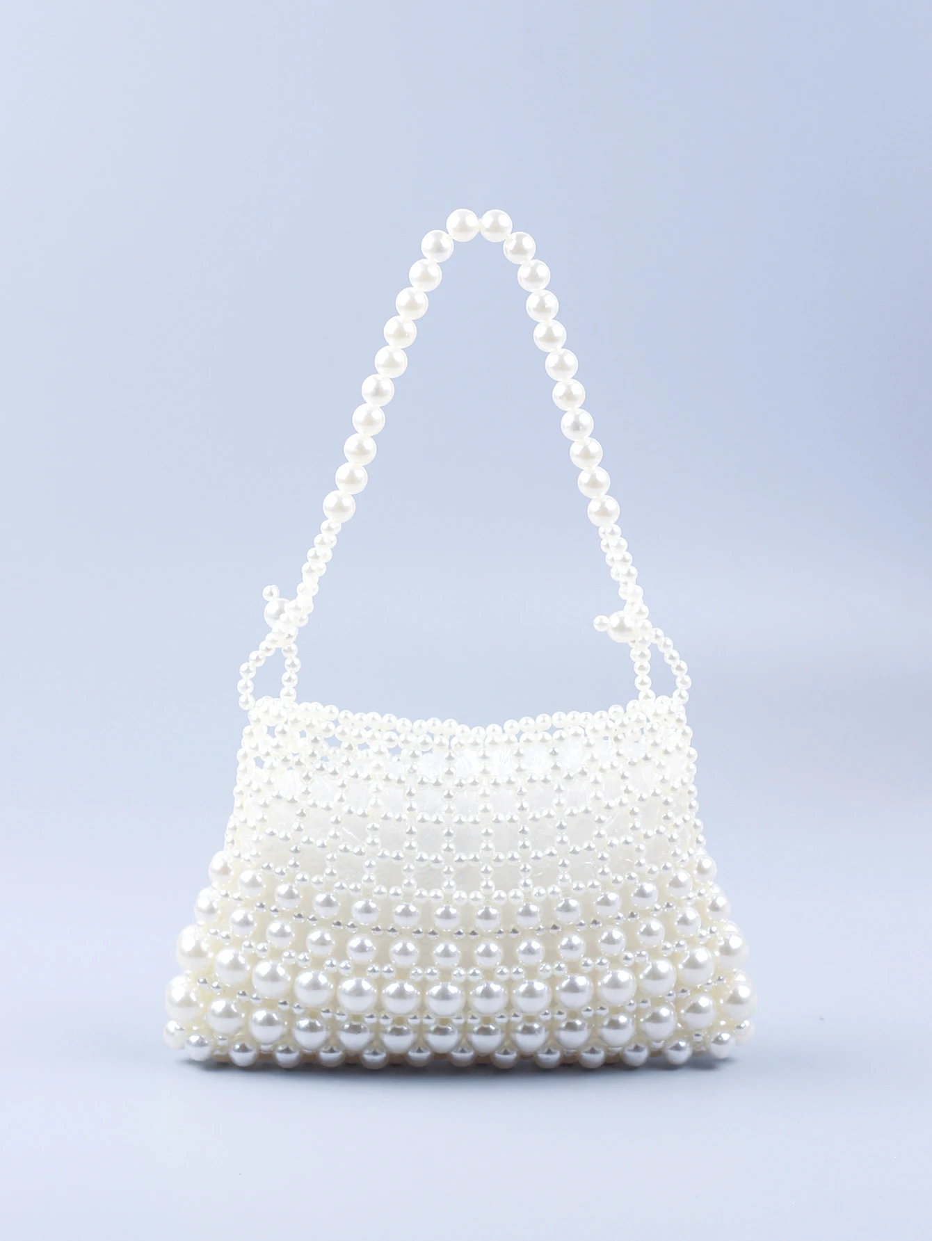 New internet celebrity 2024 Pearl Bag Women\'s Handmade Hollow Beaded Bag French Retro Handheld Women\'s Bag