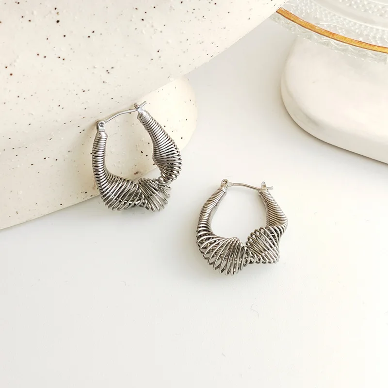 Europe and the United States three-dimensional design spring shape earrings temperament stylish metal ear ring ear ornaments