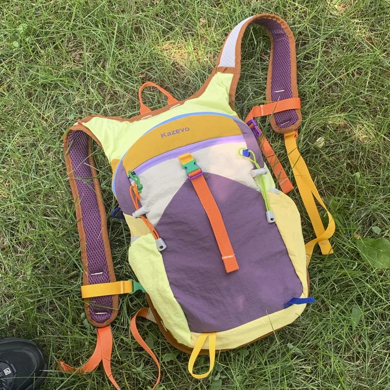 

New Color Block Outdoor Hiking Backpack Lightweight Travel Fashionable Shoulder Bag Fashion Large Capacity Commuting Backpack