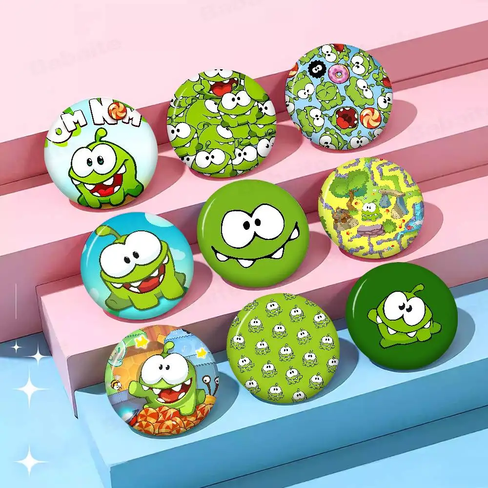 Cartoon o-Om cute n-Nom-m Tinplate Pin Button Custom Anime Role Old-school Brooch Cartoon Collar Badge Jewelry Gift Fans