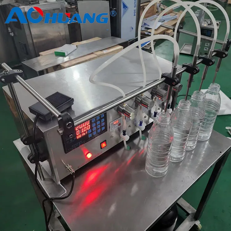Máquina tampadora de enchimento automática de 4 cabeças Máquina de enchimento de líquidos para garrafa de suco de perfume de óleo essencial