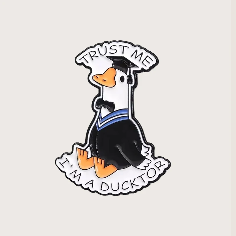 

TRUST ME I'M A DUCKTOR Enamel Pins Cartoon Funny Duck Animal Brooches Backpack Clothes Badge Fashion Lapel Pin for Gift