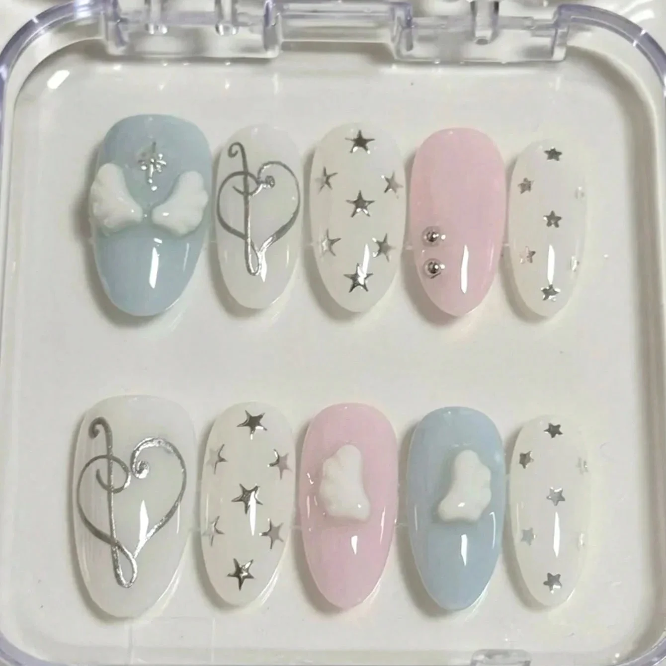 

10 pieces of hand-pressed almond-shaped nails, beautiful fake nails, with angel wing notes, suitable for women