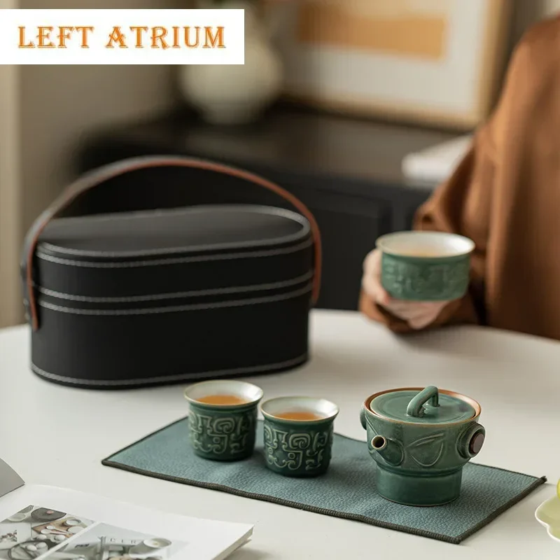 

Chinese Sanxingdui Culture Portable Travel Teaset Kit Zen Tea Maker Teapot And Cups Outdoor Portable Leather Bag Tea Accessories