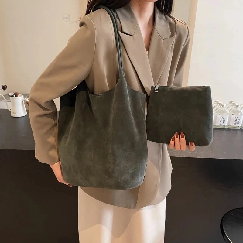 

Retro suede shoulder bag for women, new high-capacity casual bag with solid colors, versatile sewing thread with zipper crafts.