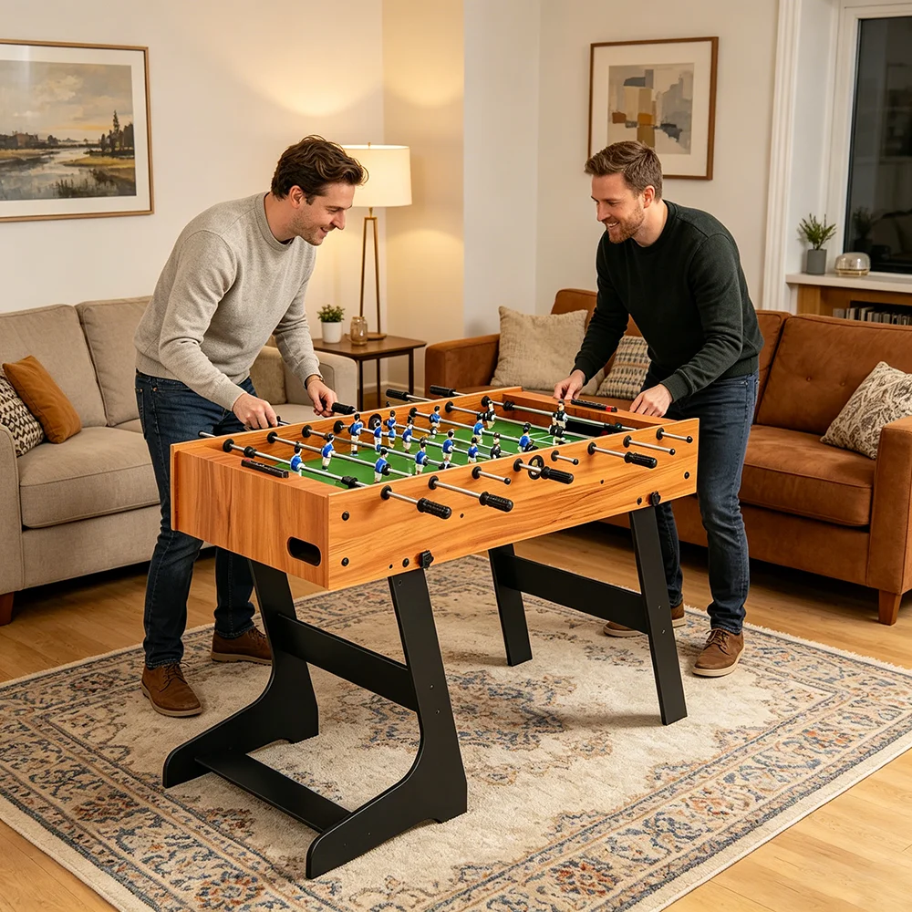 Table de baby-foot pliable 121x61x80 cm, marron clair et noir, MDF + acier, comprend 22 joueurs, 2 buts, idéale pour la salle de jeux à domicile, rangement facile