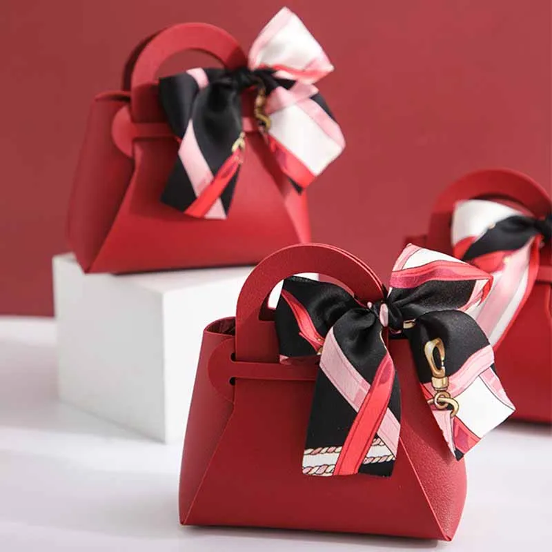 1PCS Small Leather Gift Box New Creative Handbag Shape Ribbon Bow Temperament Solid Color Candy Box With Hand Gift Bag