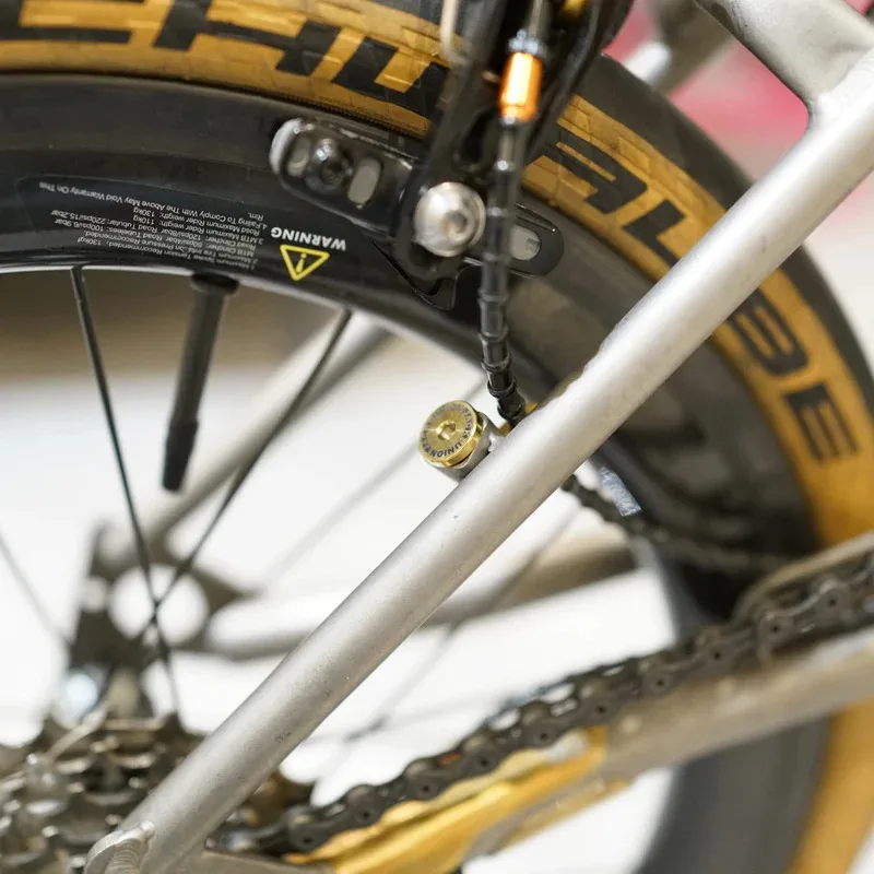 UnionJack Brompton folding bike modified titanium alloy rear fork brake C-caliber cable guide holder.
