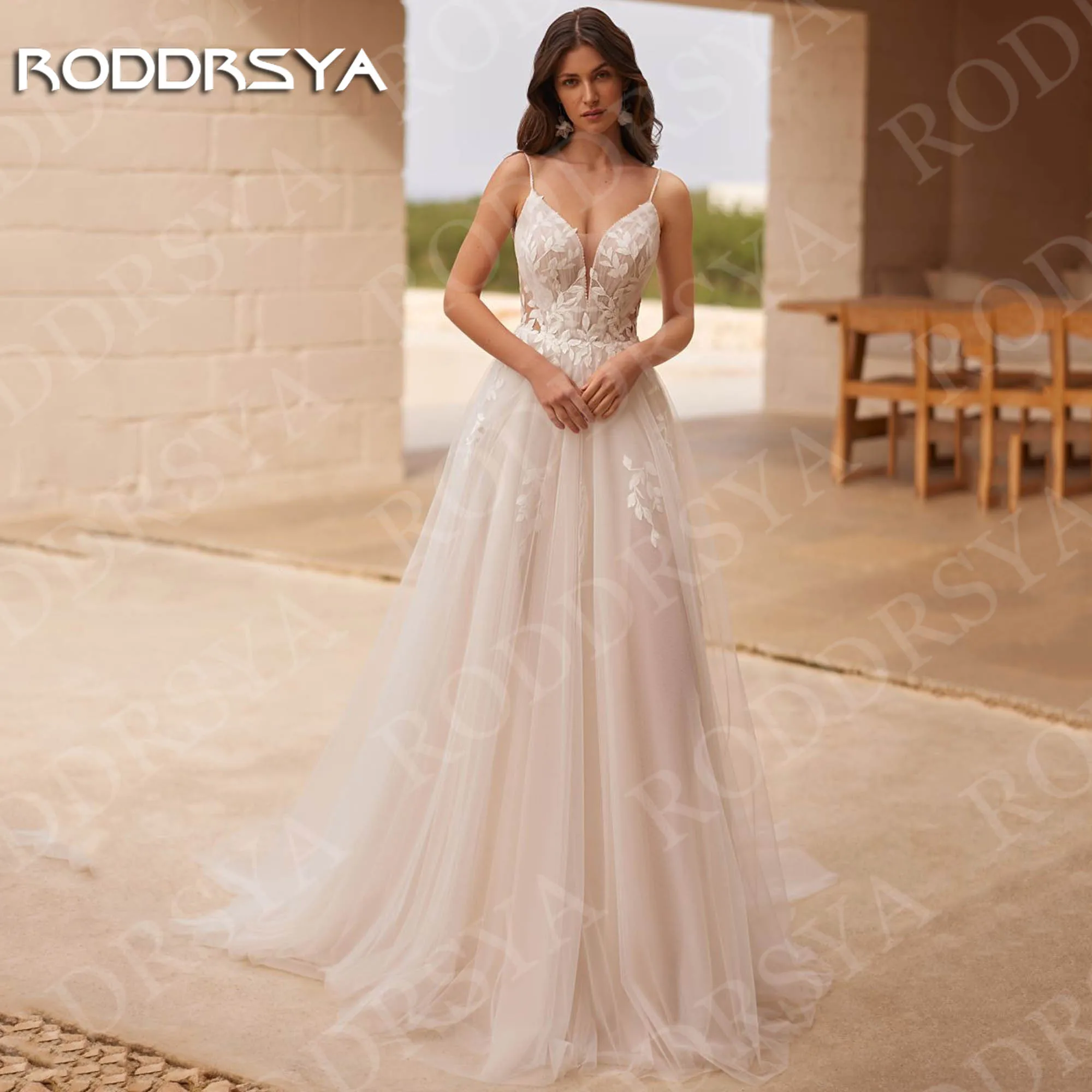 

RODDRSYA Elegant Wedding Dresses A Line Tulle Bridal Gowns Beach Lace Applique V Neck Bride Dress Spaghetti Straps Customized