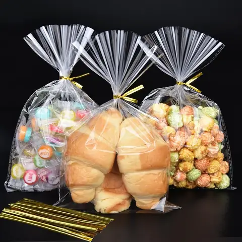 120 PCS Clear Cellophane Treat Bags with Gold Twist Ties 6.5x10 Ihes Plastic Goodie Gift Bags for Party Favo Candies Cookies Sc
