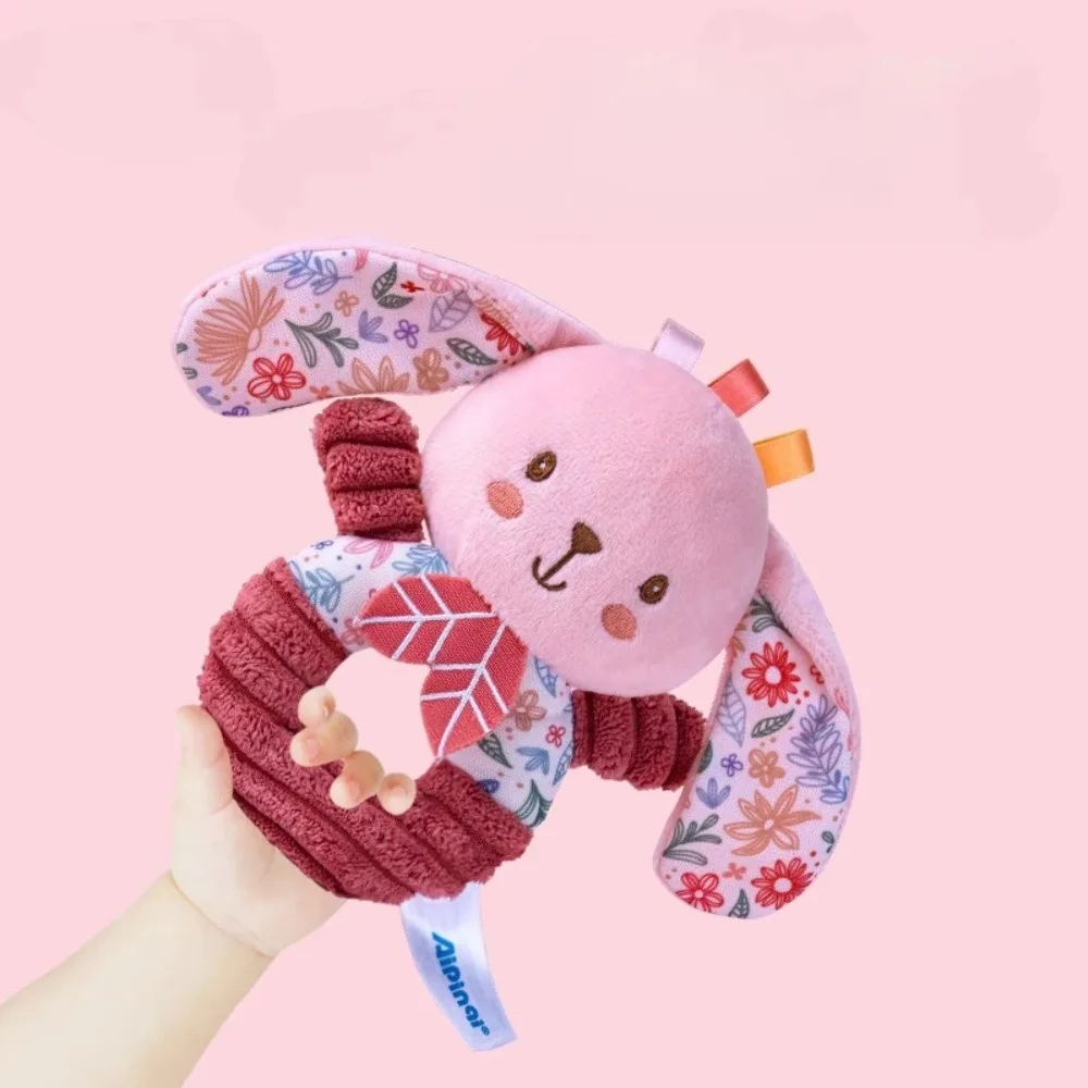 Nuovo giocattolo di peluche neonato con anello a manovella rosa, campana ad anello a mano per bambini da 0 a 1 anno, adatto per il regalo di Capodanno del bambino