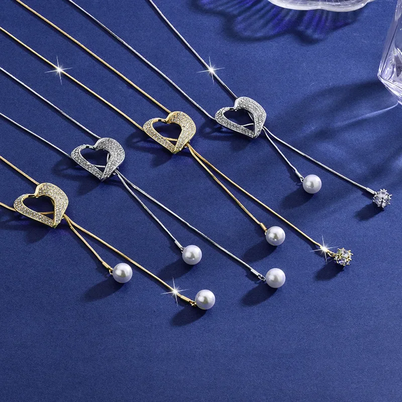 

A new heart-shaped zircon long necklace for women, featuring a simple and fashionable sweater chain