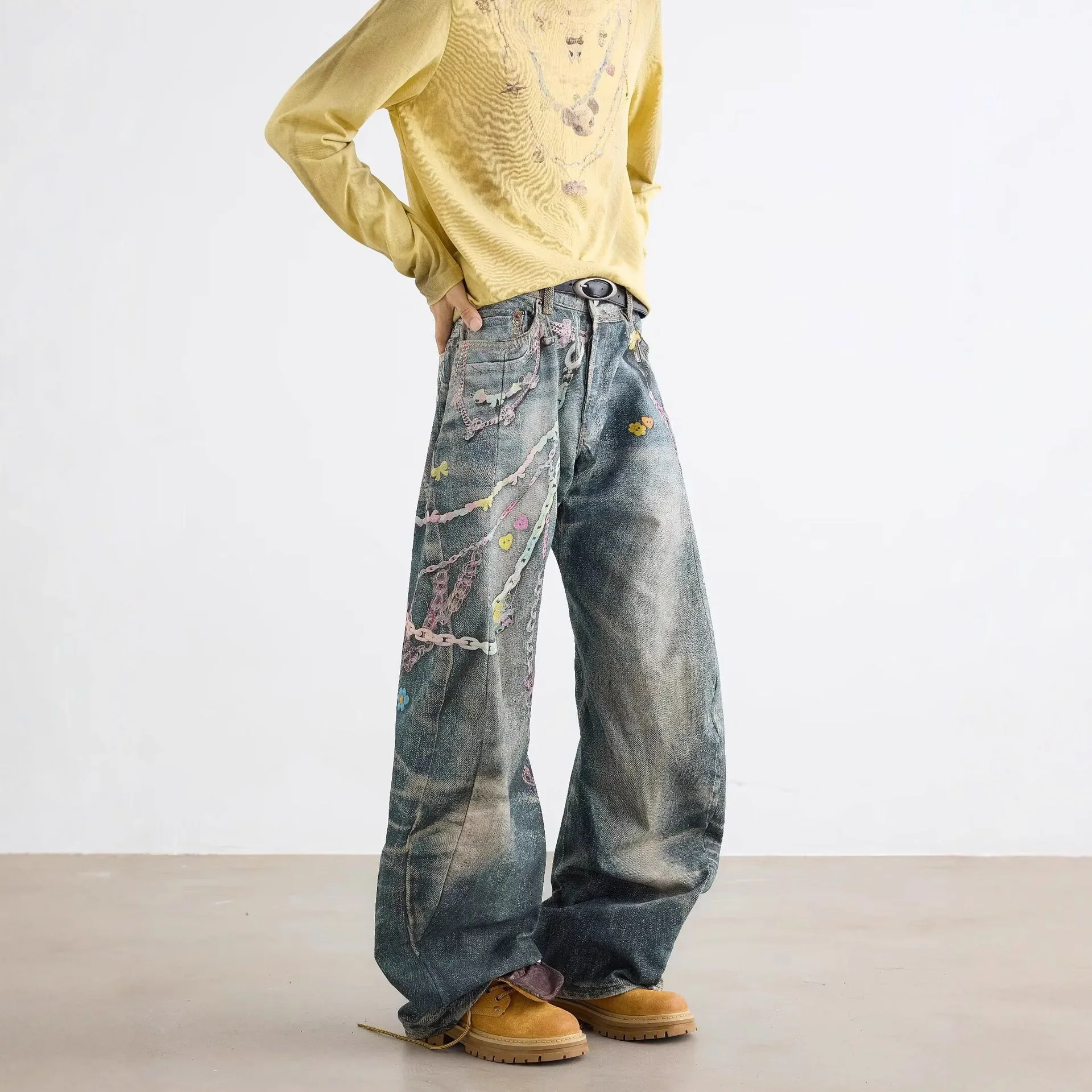 Pantalones vaqueros de pierna recta holgados de estilo americano de calle alta con estampado de cadena de caramelo pantalones vaqueros desgastados de Hip Hop para hombres y mujeres