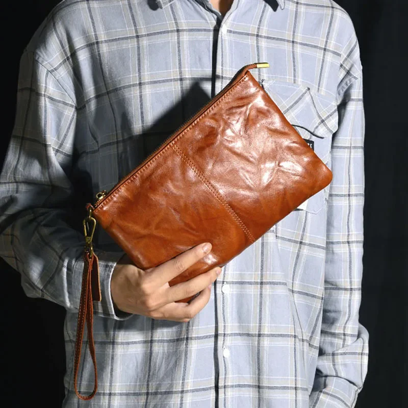 AETOO  Handmade vintage top layer cowhide simple new zipper casual men's clutch bag pleated personality design wrist bag