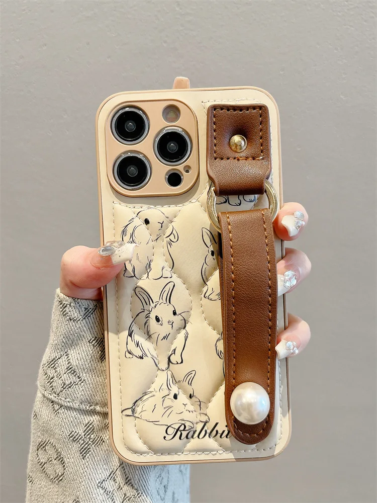 

New Suitable for iPhone 15 Pearl Wrist Strap Phone Case 14 Promax Down Jacket Fun Rabbit 13 Pro Anti Fall 12 11 Protection Cover