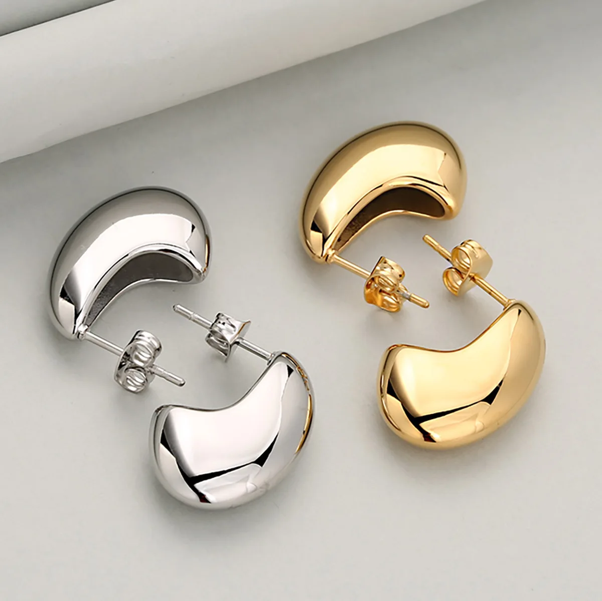 

Minimalist Texture Hollow Smooth Open Bean Waterdrop Stainless Steel Stud Earrings For Women, Versatile & Elegant