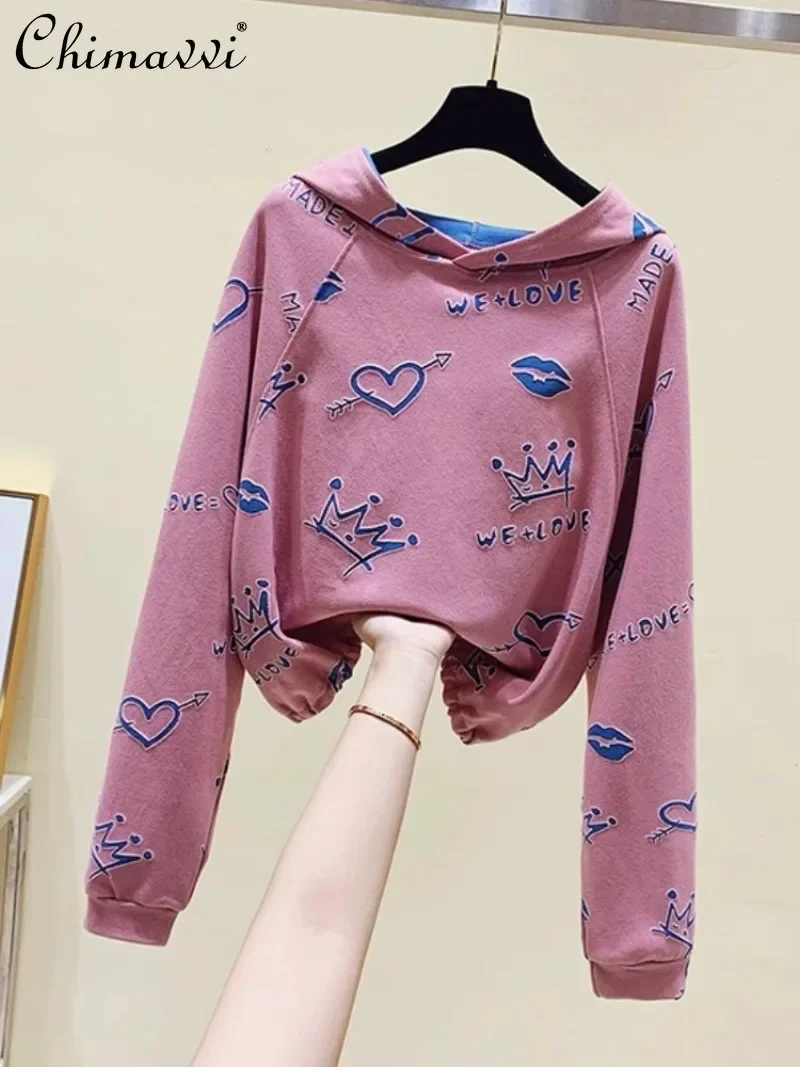 

2024 Spring and Autumn Casual Style Pink Age Reduction Printed Hooded Loose Long Sleeve Sweater Top For Women