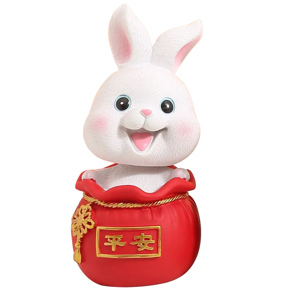 

Money Bag Rabbit Ornament Bunny Figurine Miniature Toys Shaking Head Figurines for Car Resin Adorn Ornaments Decor