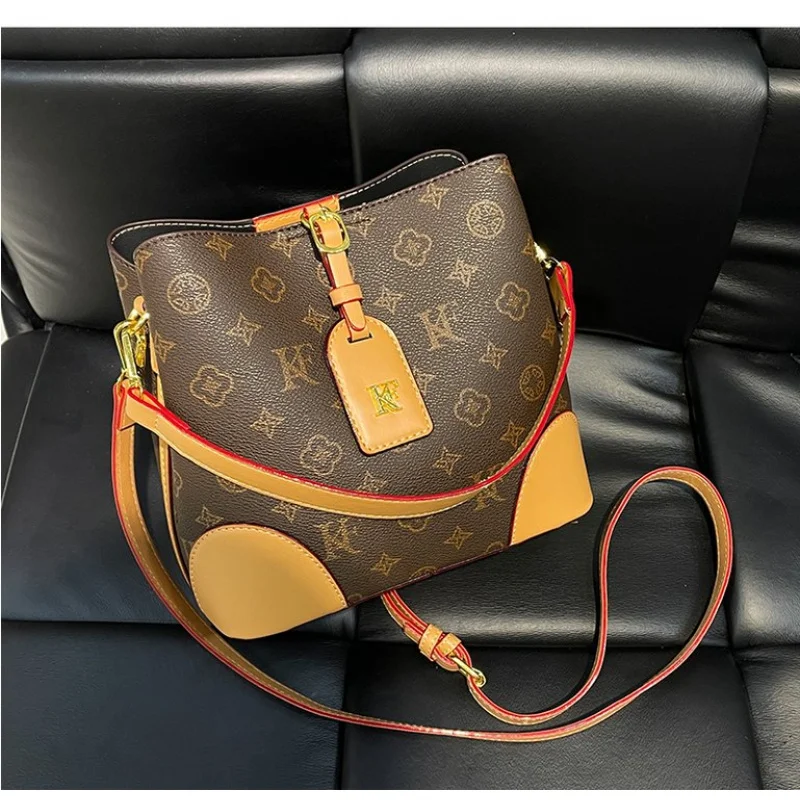 Toplaagse dameshandtassen, gemaakt van echthoekig bedrukt leer, trendy Wales, duurzame, lichtgewicht, zachte stijl