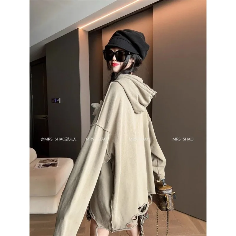 Felpa stampata a maniche lunghe con cappuccio casual allentata alla moda per le donne Top pullover di fascia alta autunno e inverno