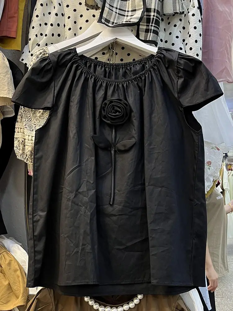 フレンチスイート年齢軽減デザインニッチ立体フラワーパフスリーブシャツ女性の新しい夏のトップ