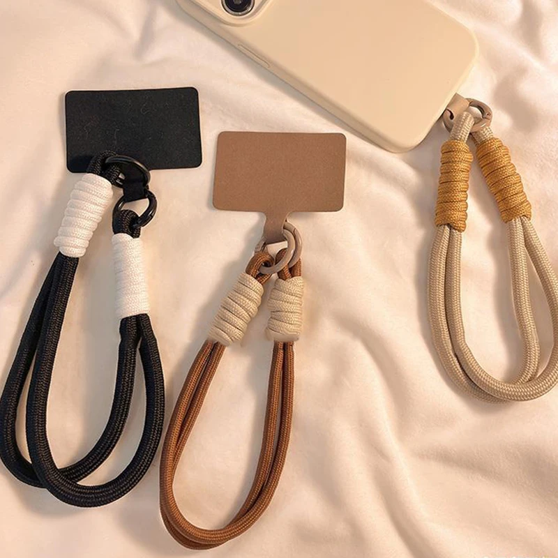 حبل الهاتف المحمول Chic INS Style، مضفر ولون خالص، سوار معصم مضاد للخسارة مع فاصل ساحر
