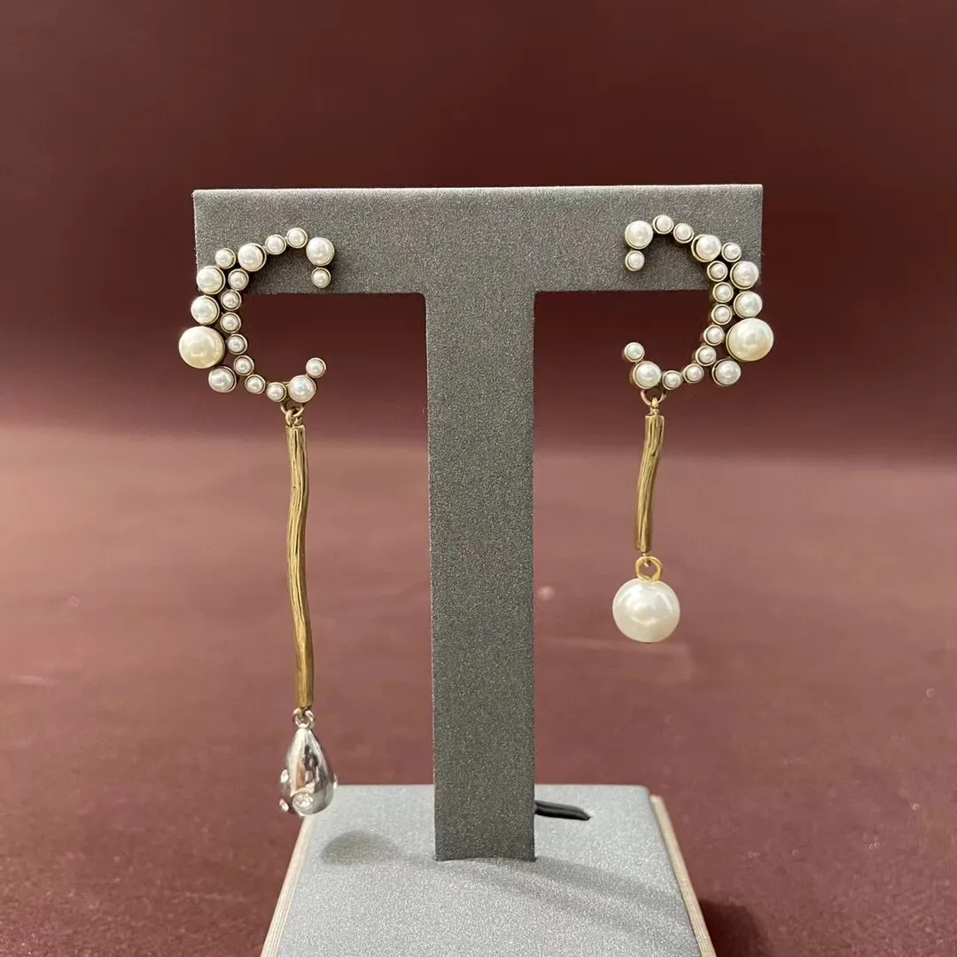 

Exquisite fashion pearl asymmetrical elegant earrings