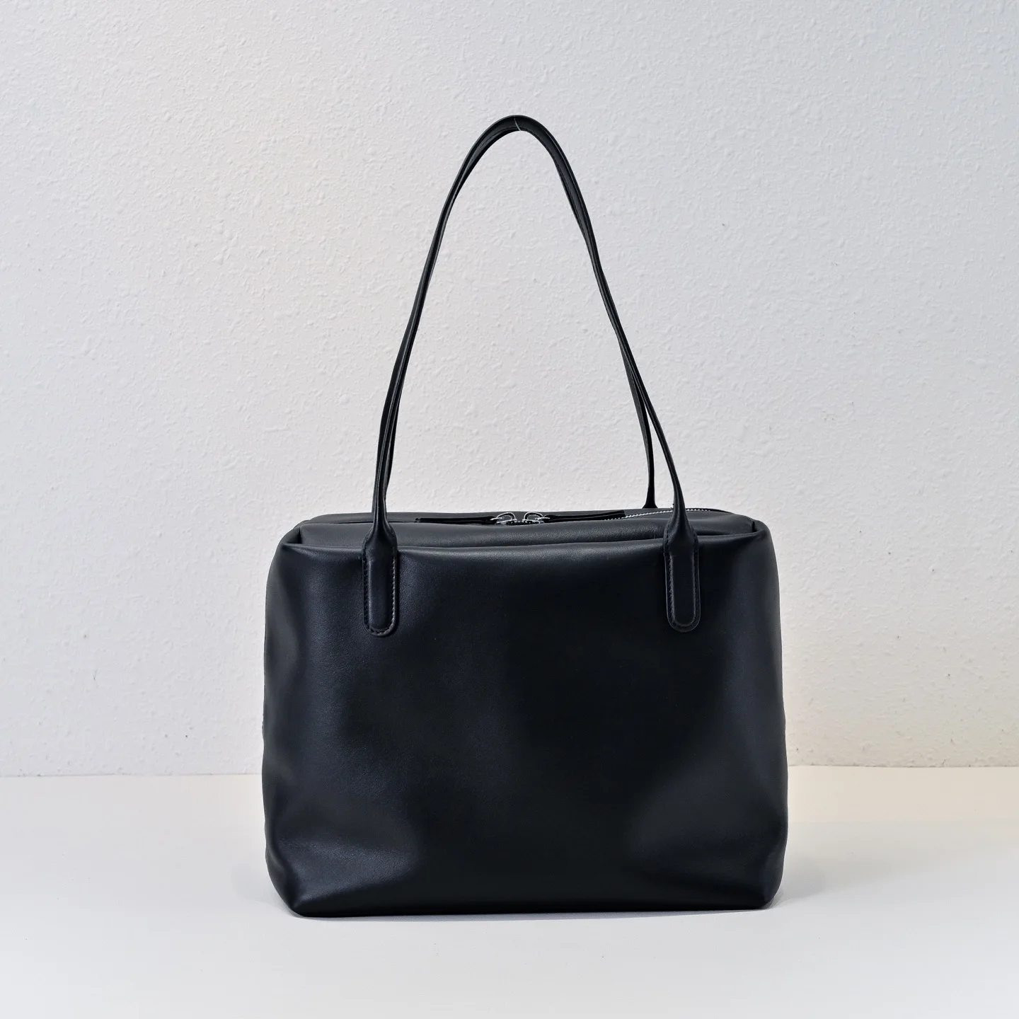 2025 bolso multifuncional de una sola habitación de piel de oveja en forma de tofu nuevas de cuero de alta calidad para mujer, estilo de mano