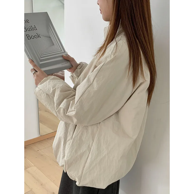 YERMORA البيج سستة جيب موجز عادية أسفل معطف للنساء الوقوف طوق كم طويل فضفاض جديد سترة موضة المد شتاء 2025