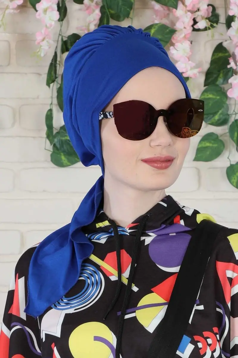 O osso penteado com cinto saks azul