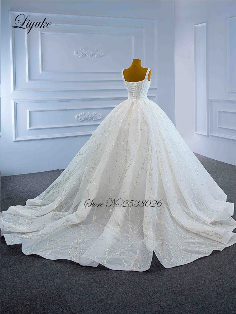 Liyuke مخصص الحبيب السباغيتي الأشرطة الكرة ثوب الزفاف من يزين مذهل الدانتيل التنانير الزفاف