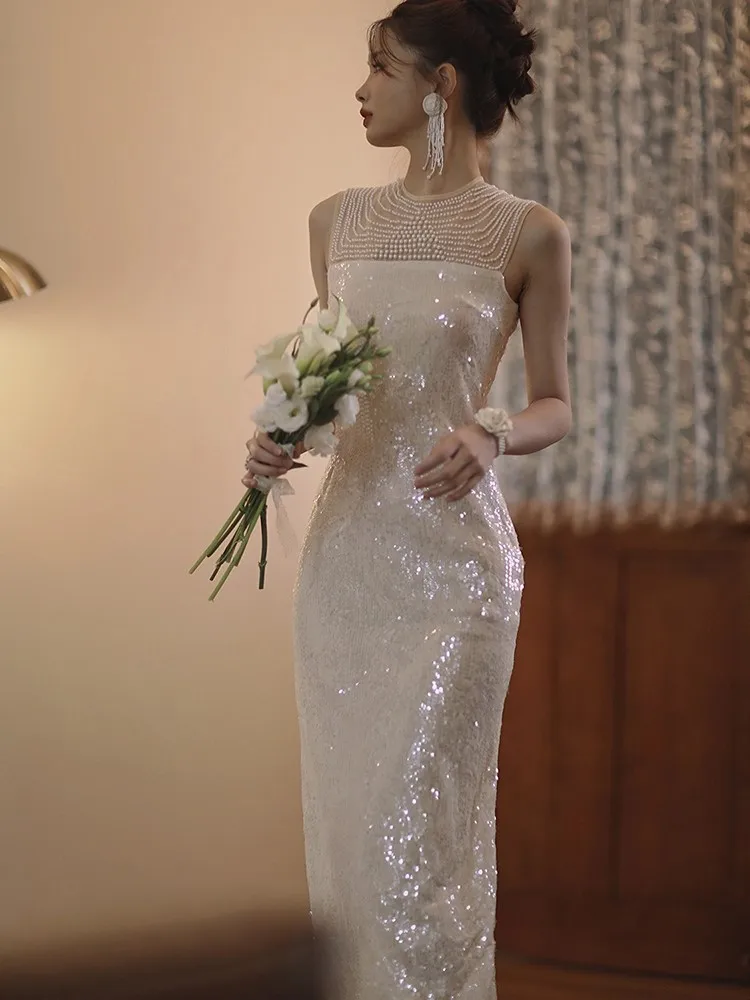 

Light luxury and niche champagne-colored sequined host dress toasting morning robe