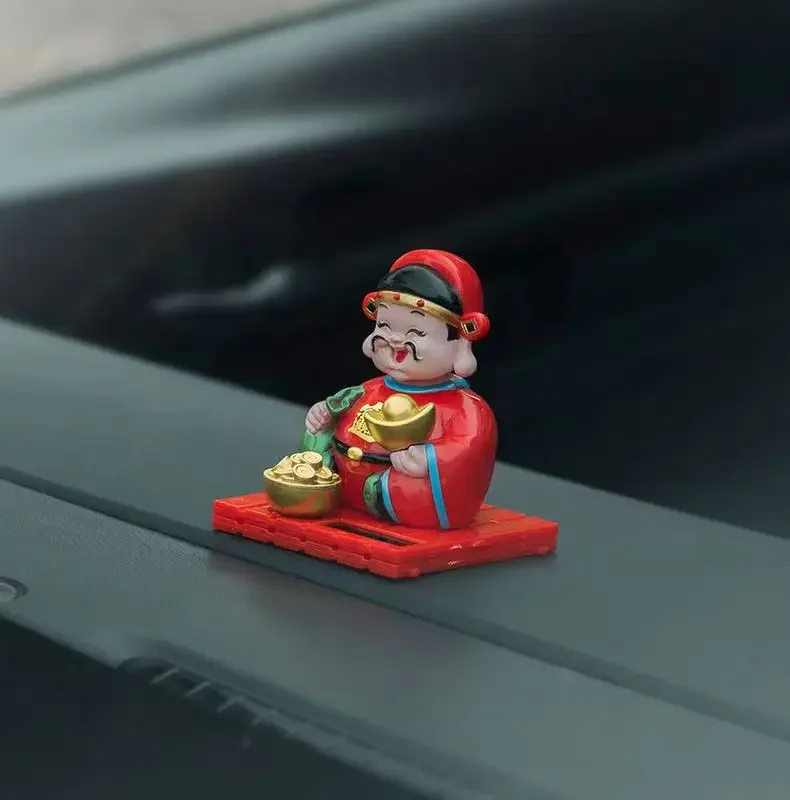 Car decoration The latest solar wealth God car nod with creative interior decoration supplies
