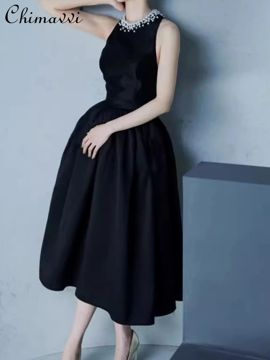 

High-End Hepburn Style Pearl Collar Black Dress Fashion Round Neck Sleeveless Midi A- Line Large Hem Vest Party Dress Women