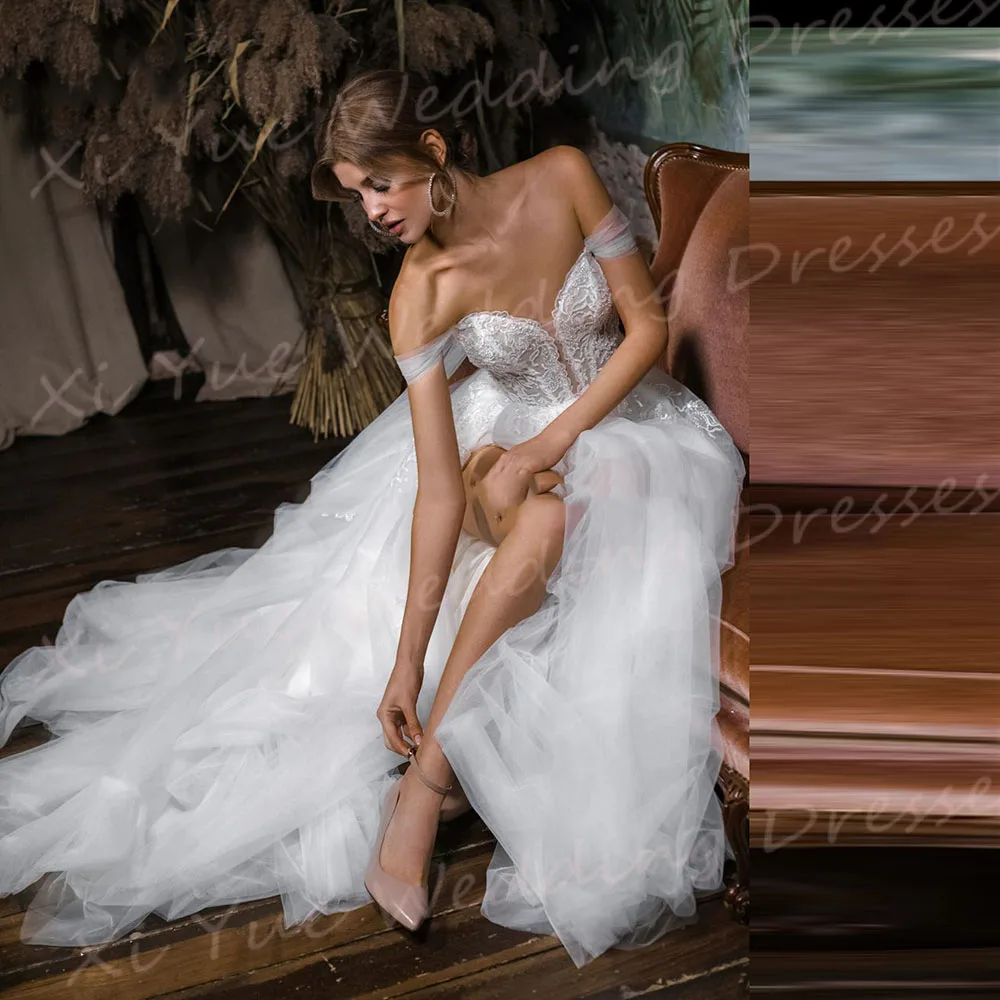 Affascinante una linea abiti da sposa da donna eleganti Appliques di pizzo abiti da sposa Sexy spacco laterale con spalle scoperte Vestido De Noivas