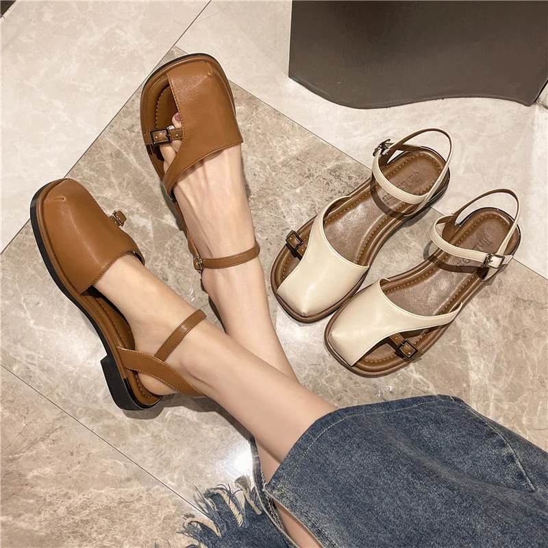 Flat casual braided Roman sandals women's new summer one-line buckle braided head sandals C1437