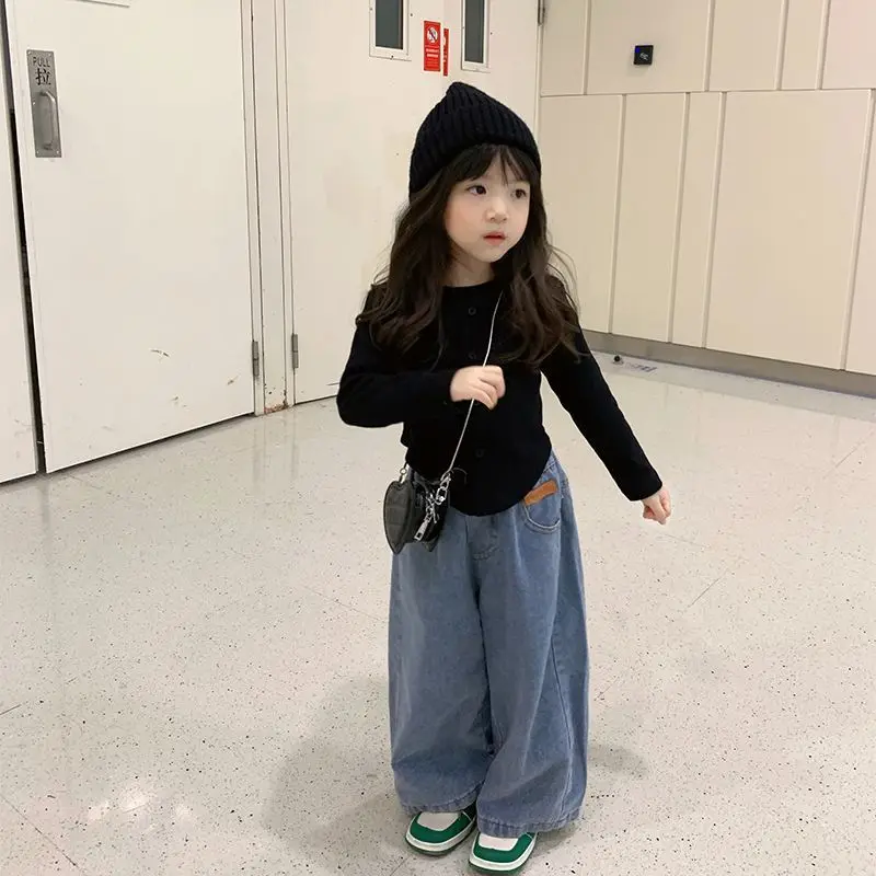 Black top + wide-leg pants