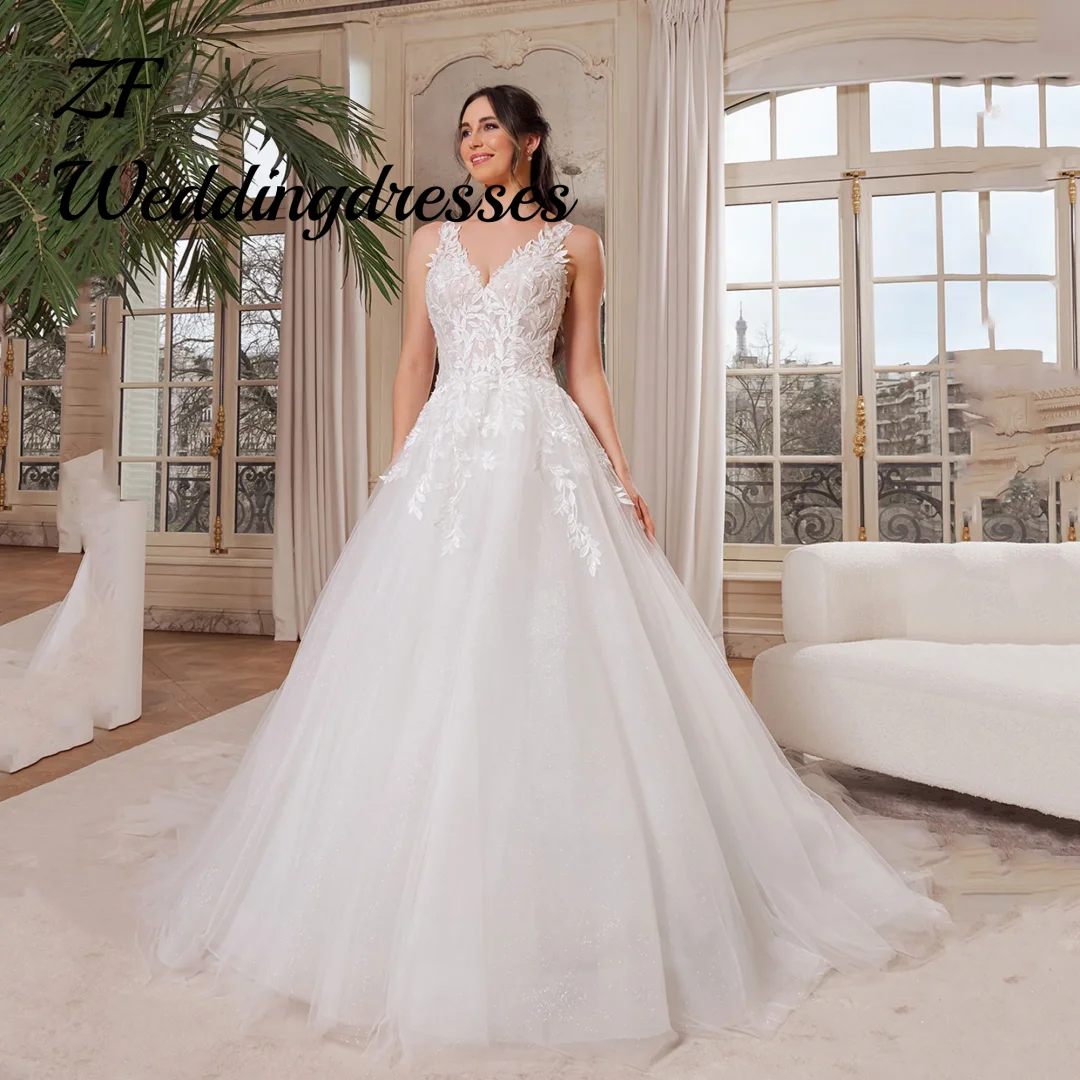 Maßgeschneiderte Applikationen Tüll Brautkleid V-Ausschnitt A-Linie ärmelloses glänzendes Brautkleid rückenfrei Illusion Vestidos de Novia