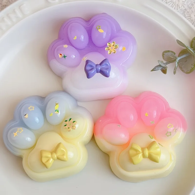 Dopamin-Macaron-Serie, Kunstharz-Ton-Katzenpfoten-Quetschspielzeug mit Blumenschleifen – Pastellfarben (Lavendel, Gelb, Rosa, Blau, Weiß) f