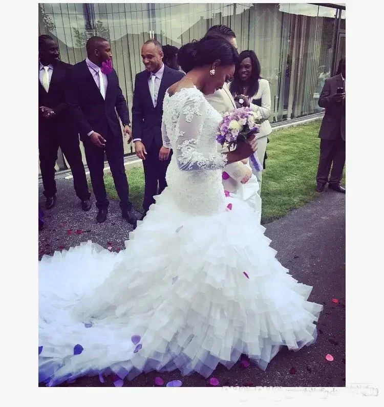 Customized Lace Ruffles African Mermaid Wedding Dresses Sheer Long Sleeve Tiers Plus Size Fitted Bridal Gown Train Bride Dress