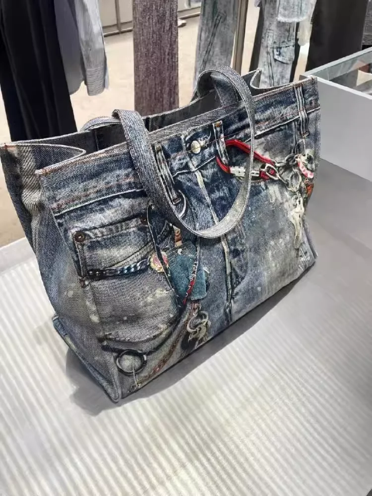 Bolso de hombro de mezclilla con estampado creativo de colores mezclados, bolso de mano de bolsillo de Jeans novedoso personalizado, bolso de compras de retazos Popular para mujer