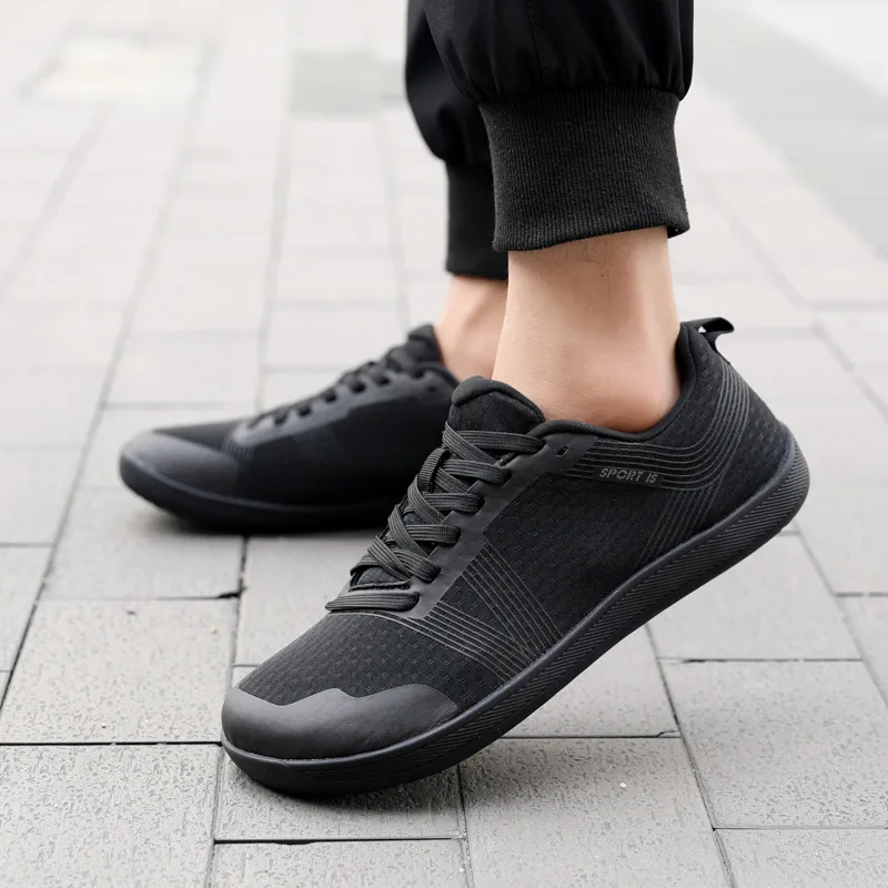 ใหม่แฟชั่นรองเท้าผ้าใบBreathableตาข่ายกว้างรองเท้ากีฬากลางแจ้งเดินรองเท้าSoft Sole Lace Up Men Runningรองเท้าผ้าใบ