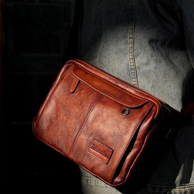 Retro genuine leather crossbody bag for men vegetable tanned cowhide single shoulder bag for casual commuting postman bag.