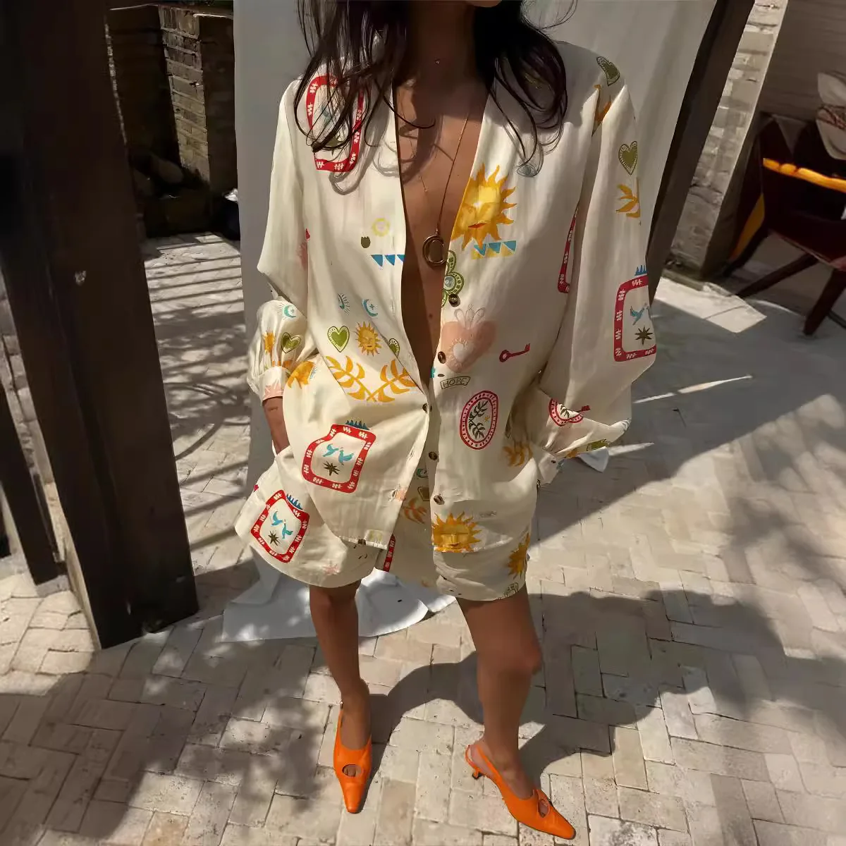 

Женские модные комплекты из двух предметов с эластичной резинкой на талии, элегантный топ с лацканами и длинными рукавами с цветочным принтом, короткие брюки, костюм, повседневная праздничная одежда