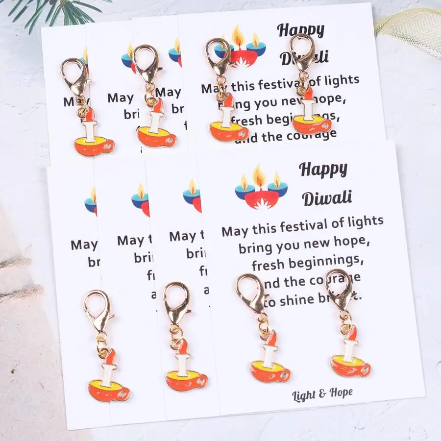 1/5/10/20/50/100pcs Unique keychain sets featuring Diwali candle motifs, small charms, and inspirational pocket-sized cards—perf