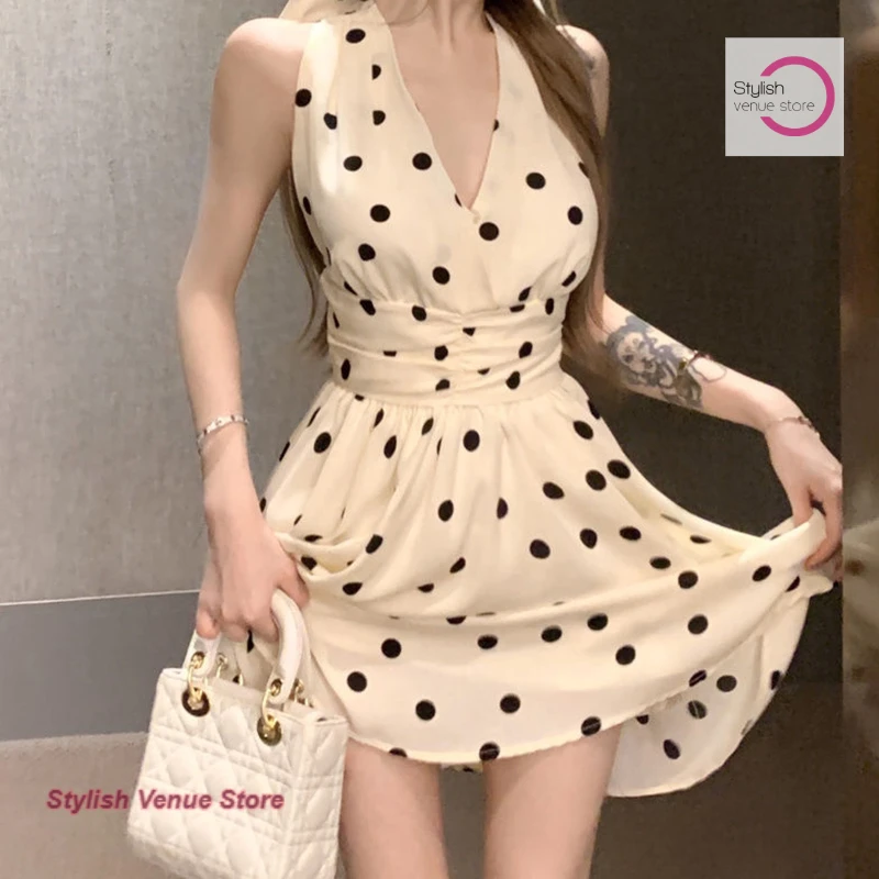 French sweet casual white bow halter polka-dot dress female summer new fashion temperament waist slim sexy Joker A-line skirt.