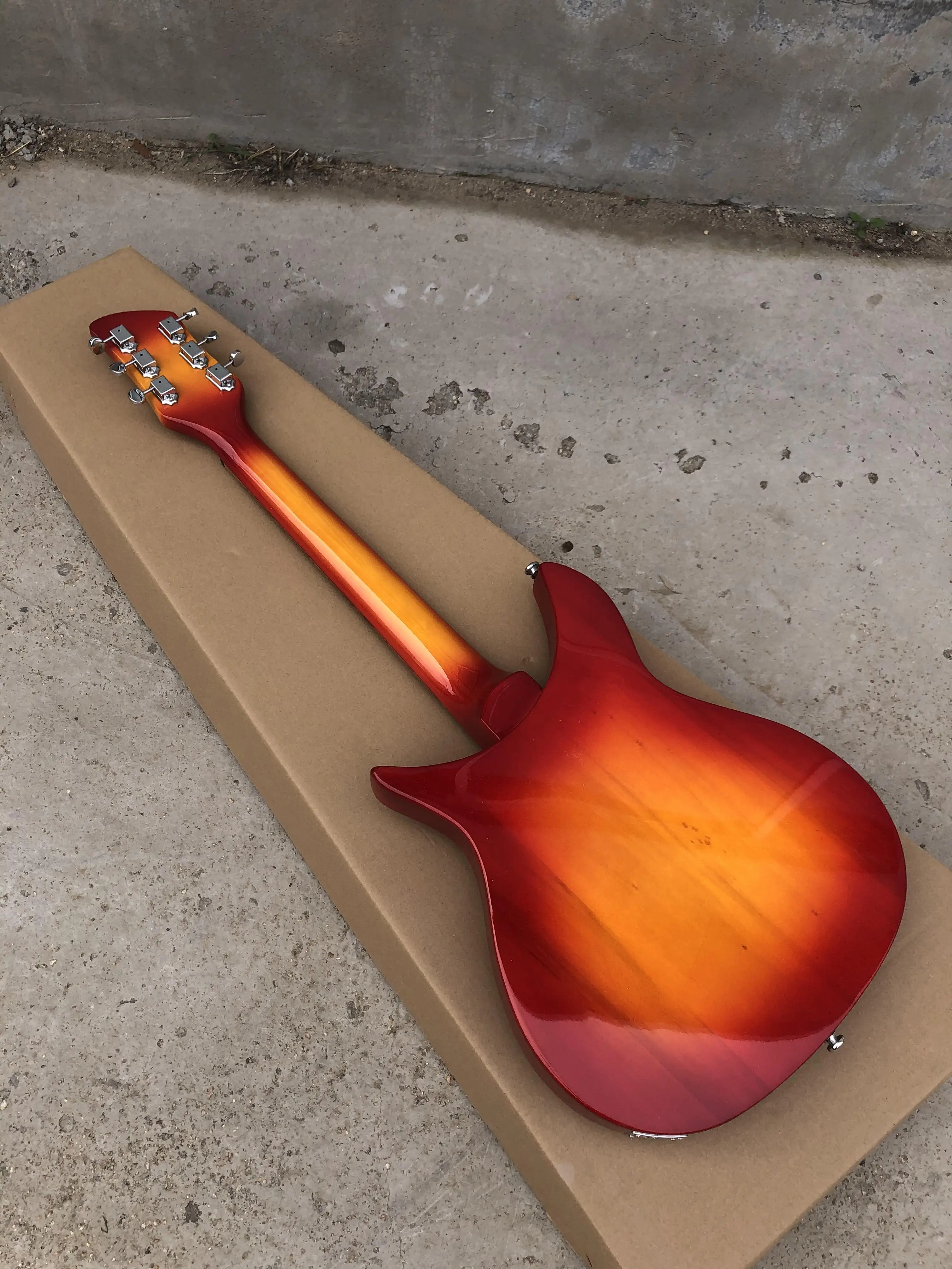 Electric Guitar with Rickenbackerf Hole, Cherry Sunburst Color, RosewoodFretboard, Tremolo System, Semi-Hollow Body Instrument,