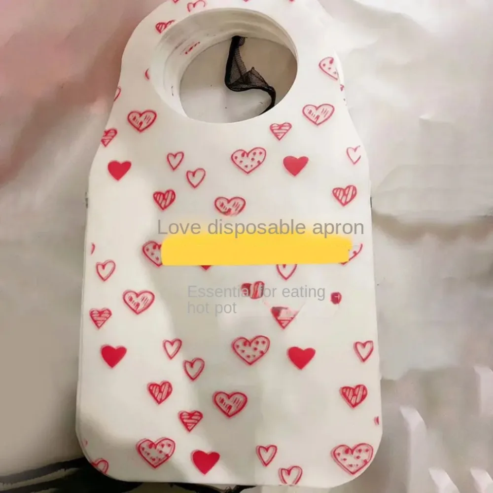 10 unids/bolsa delantales desechables con estampado de corazón portátil, delantal de cocina antiincrustante no tejido, babero a prueba de aceite, suministros para el hogar y restaurante