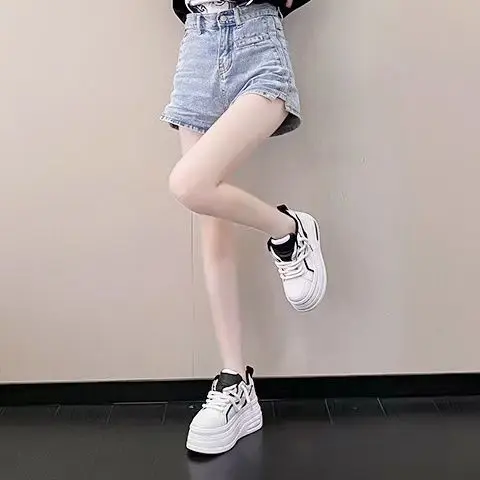10CM invisible height increasing white shoes for women 2025 new thick soled sponge cake wedge heel breathable board shoes