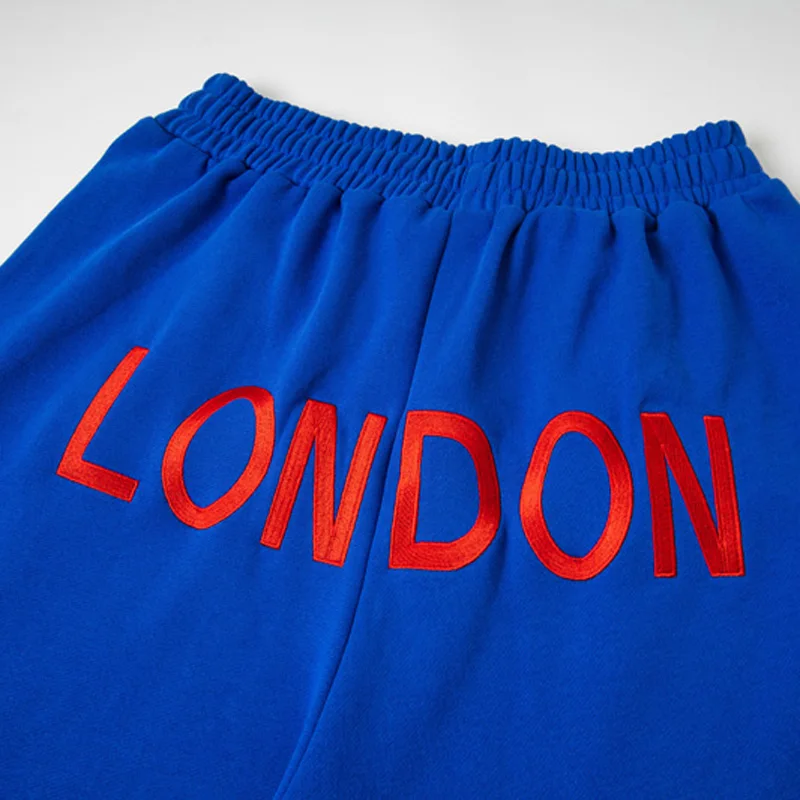 الاتجاهات الأوروبية الأمريكية Mowalola Sweatpants الشارع الشهير العلامة التجارية عالية الجودة الكلاسيكية التطريز سراويل تقليدية الرجال النساء #4